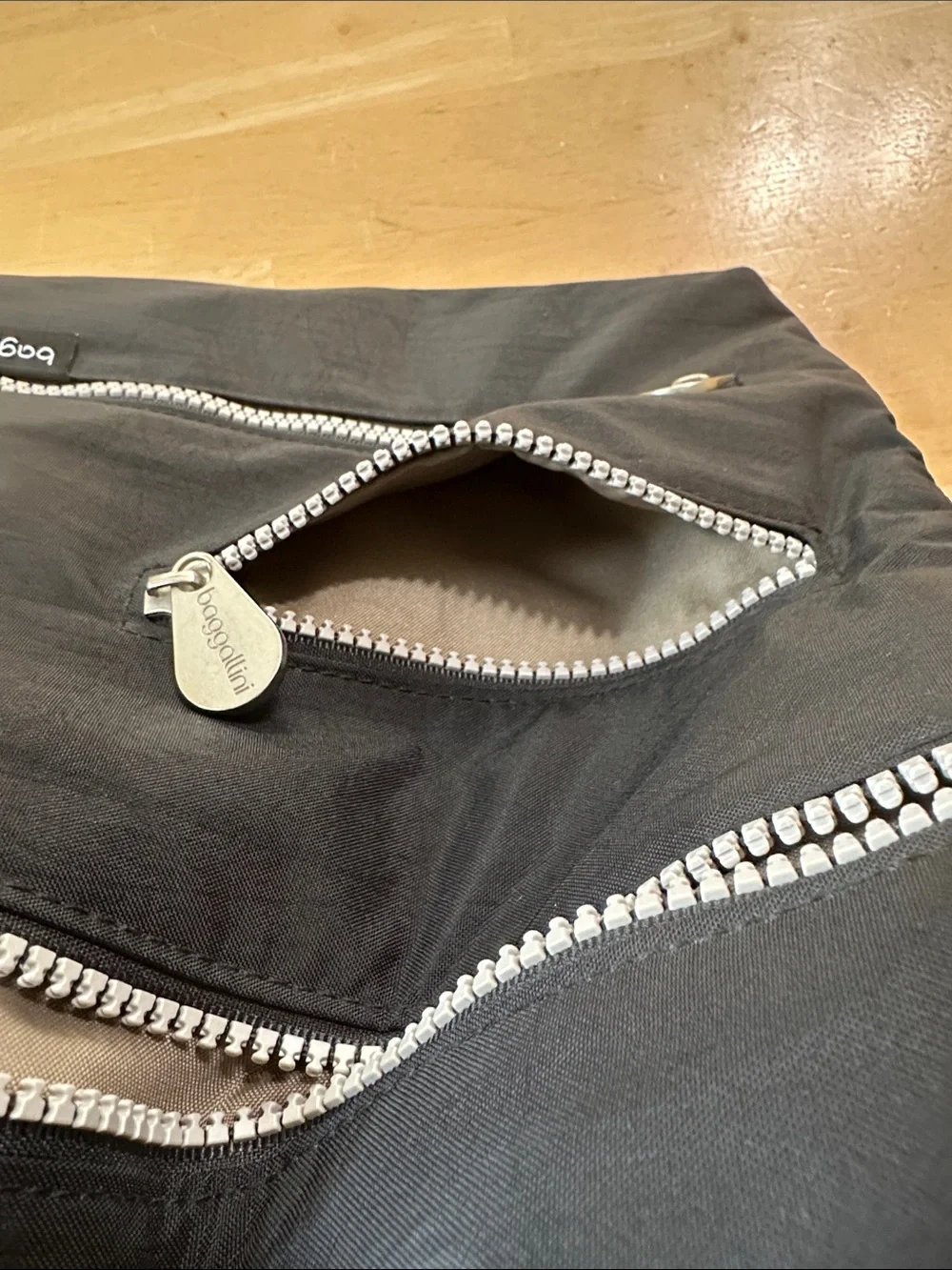 Baggallini Black Crossbody Sling with Silver Zippers